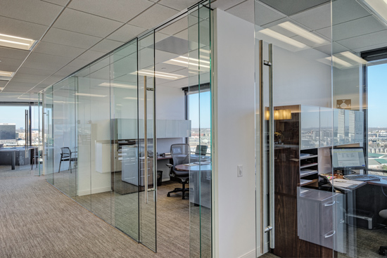 Sliding doors are a more space-effective solution than swinging doors because they require that less space be kept clear and unobstructed for the door to work properly.