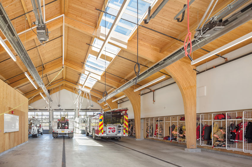 Fire Station 76: Gresham, Oregon
Architect: Hennebery Architects
Structural Engineer: Nishkian Dean Structural Engineers

Part of the structural system, the arches in this apparatus bay are designed to resist vertical and lateral loads required for essential facilities under the Oregon Structural Specialty Code. This project won a 2016 WoodWorks Wood Design Award.