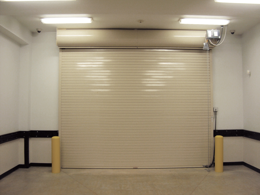 Insulated rolling steel doors are ideal for use in places with very low headroom, as seen from the internal view of this door in Amarillo, Texas.
