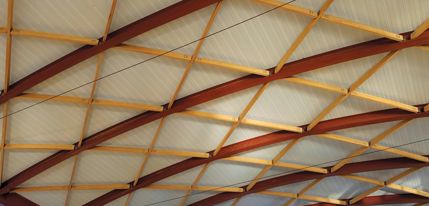 Williamson County Regional Airport terminal project in Marion, Illinois, the A/E firm RS&H has designed a domed roof structure with hybrid steel-and-bamboo cross bracing. 