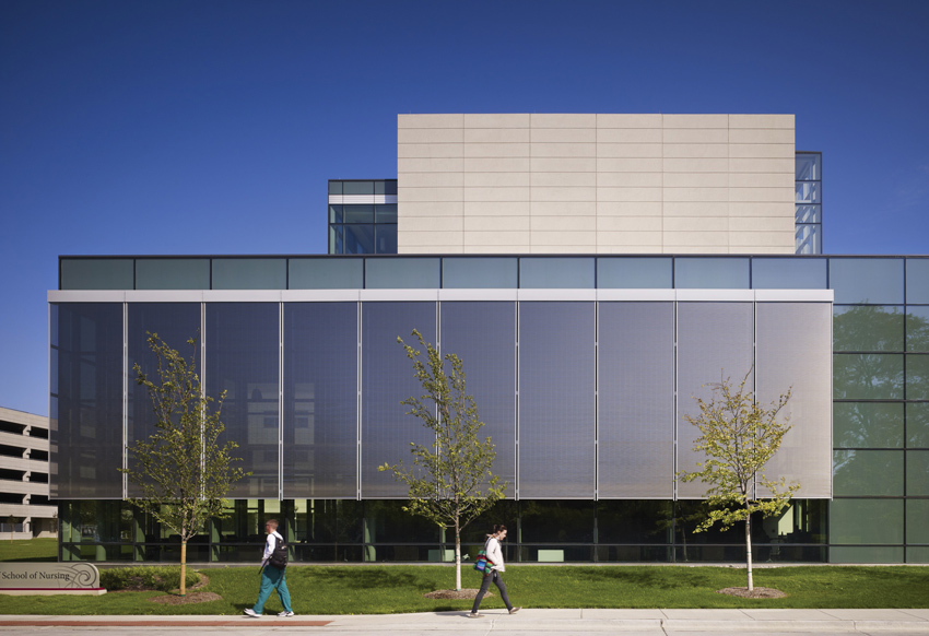 At Loyola University’s Marcella Neihoff School of Nursing in Chicago, Illinois, designed by Solomen Cordwell Buenz, automatically controlled solar shades on the west facade and fixed louvers on the south facade are so effective that a thermally activated slab is capable of meeting all the cooling demand in the space. 