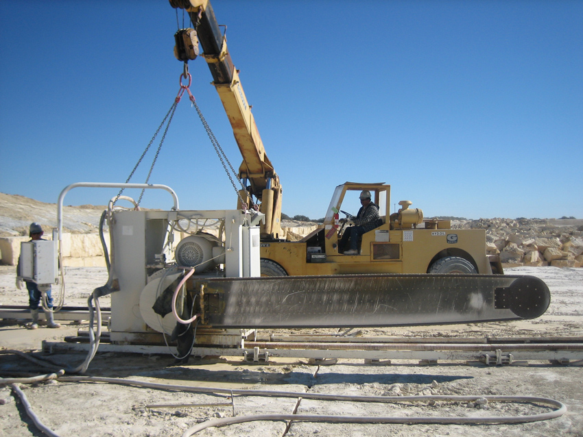 Quarry operations of limestone involve cutting large blocks and then tipping or leaning them onto their side to be carried to the mill. 