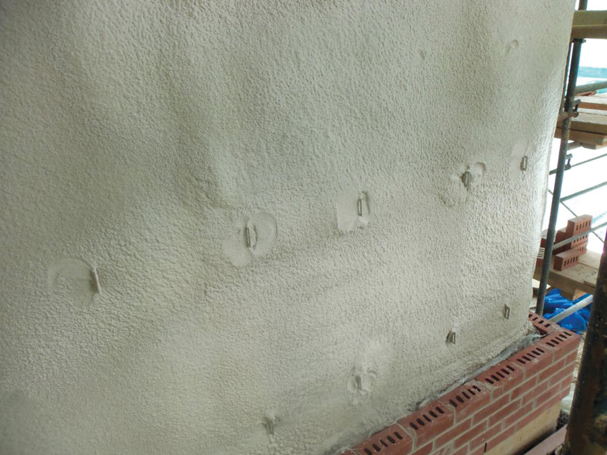 Photo of a spray foam insulation surface.