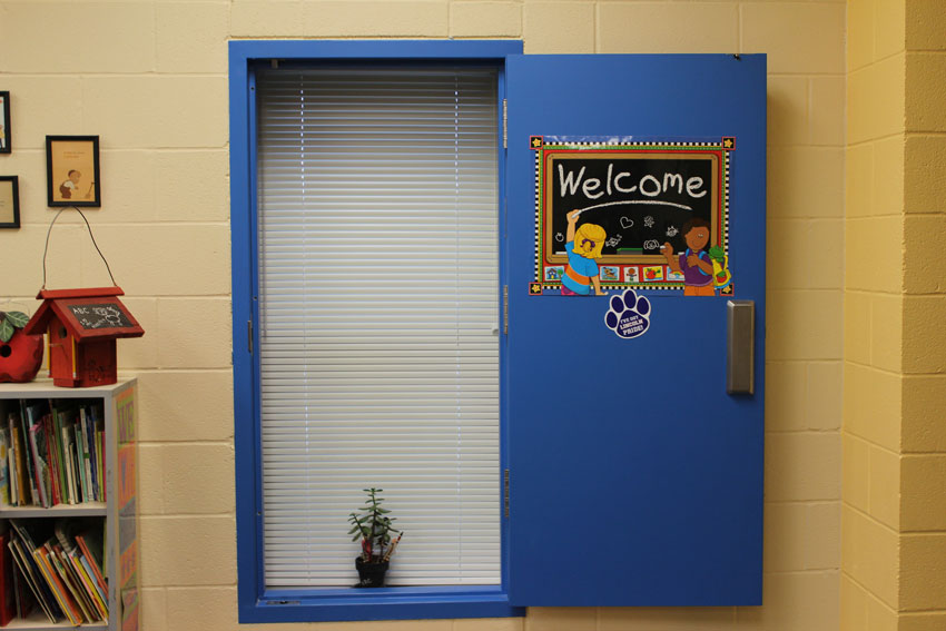 Tornado shelter-certified school storm shutters