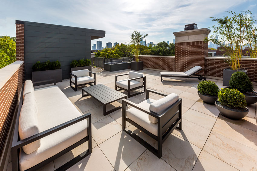 Natural stone is used as a roof deck walking surface at a private residence in Chicago.