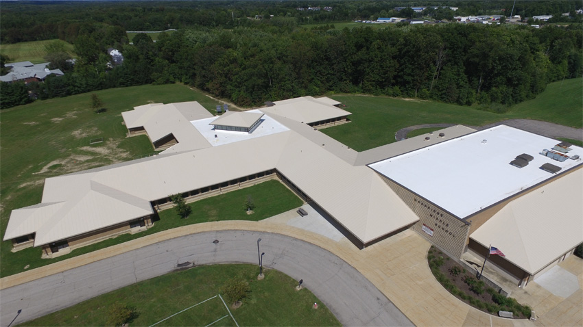 Aerial view of a large building's roof.