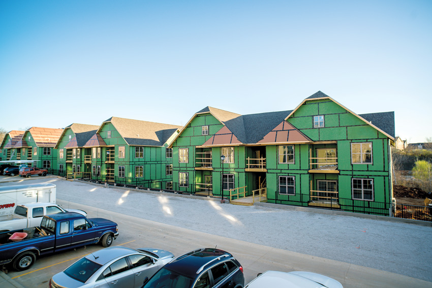 Photo of houses with structural sheathing.