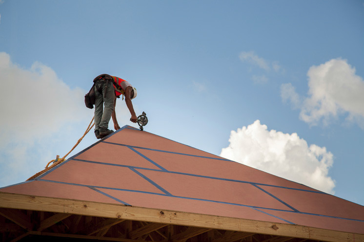 Photo of a roof with structural sheathing with taped seams.