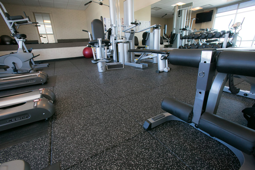 Image of Slate in Omaha, Nebraska, features a fitness center surrounded by apartments.