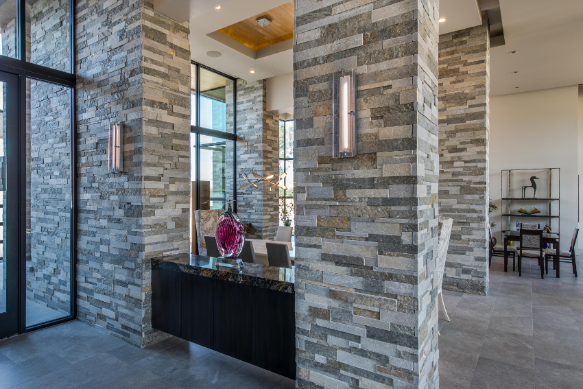 Inside of a building. This charcoal and white quartzite stack stone from Northern Stone Supply was supplied by Arizona Stone