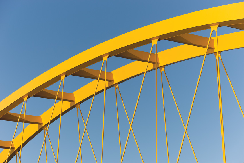 Yellow paint on a bridge arch