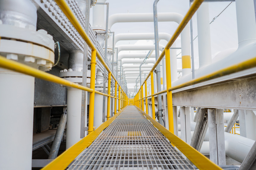 yellow coating of a stair rail in a factory