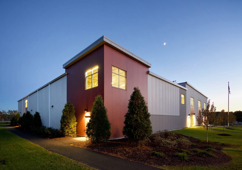 Imp in a red color and shades of gray covering the Exeter YMCA in Exeter, New Hampshire.