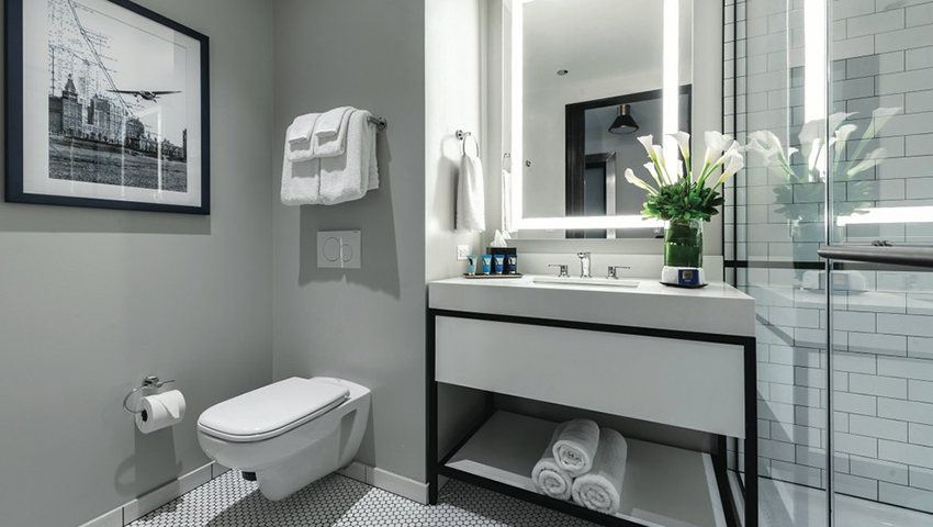 The use of in-wall toilet systems improves the overall aesthetic of retail and hospitality restrooms and also brings notable performance benefits.